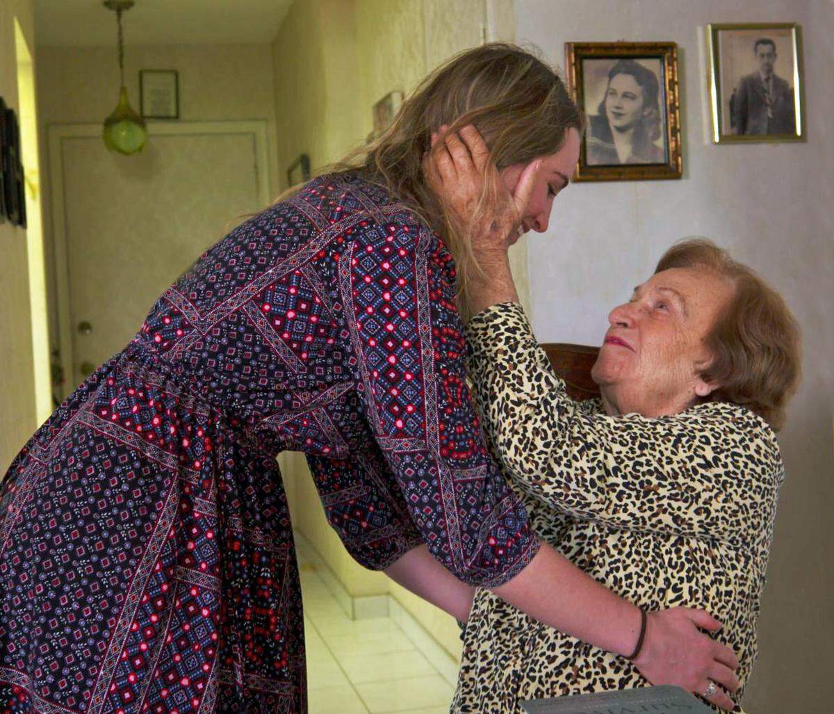 Kaelyn Lynch, left, a journalist living in Santa Fe, is reunited with Rachel Steinberger, the Holocaust survivor she was paired with in the University of Miami’s Holocaust Survivors Student Internship program.
