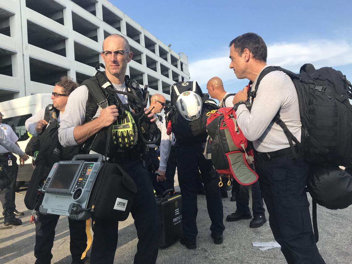 Team members carry on their backs food and clothing for three days. Some have more equipment. On the left is Myles Kaplan, a county paramedic with a “life pack” that has a heart monitor and defibrillator. On the right is Chris Pecori, with breathing equipment.