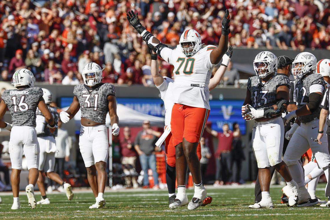 Miami Hurricanes offensive lineman Markel Bell (70) reacts after the Canes score on a field goal against the Virginia Tech Hokies in the first half at Lane Stadium in Blacksburg, Virginia, on Saturday, November 22, 2025.