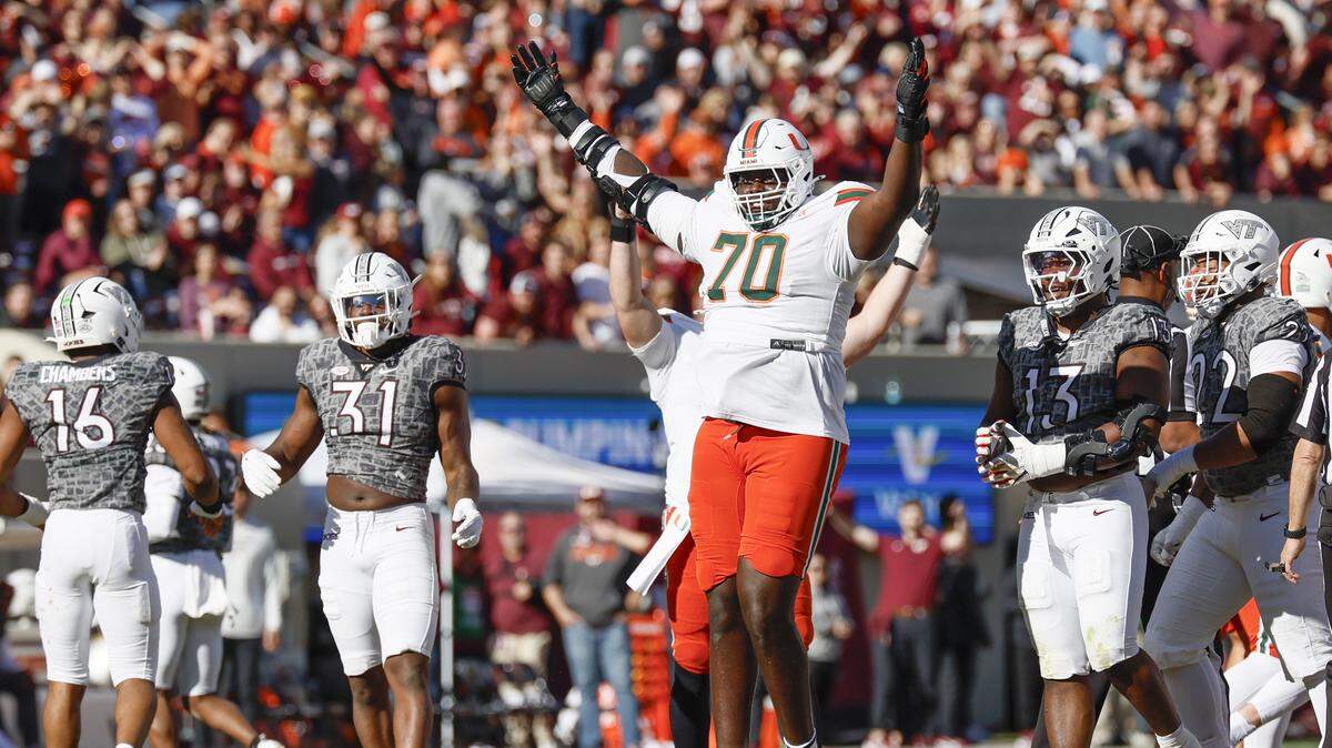 Miami Hurricanes offensive lineman Markel Bell (70) reacts after the Canes score on a field goal against the Virginia Tech Hokies in the first half at Lane Stadium in Blacksburg, Virginia, on Saturday, November 22, 2025.