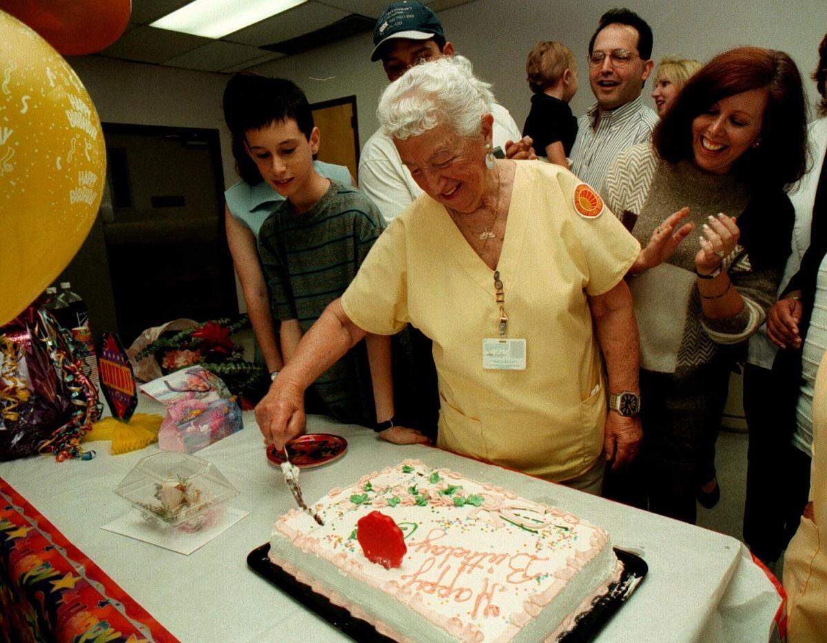 Ida Lubow had a surprise birthday party at South Shore Hospital where she is a volunteer.