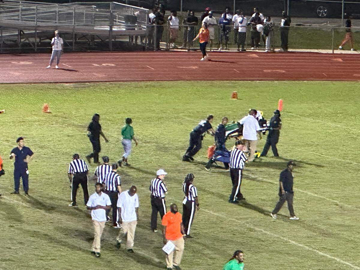 Blanche Ely linebacker Cameron Davis is taken on a stretcher to an ambulance after suffering a neck injury during Friday’s game against Delray Beach Atlantic.