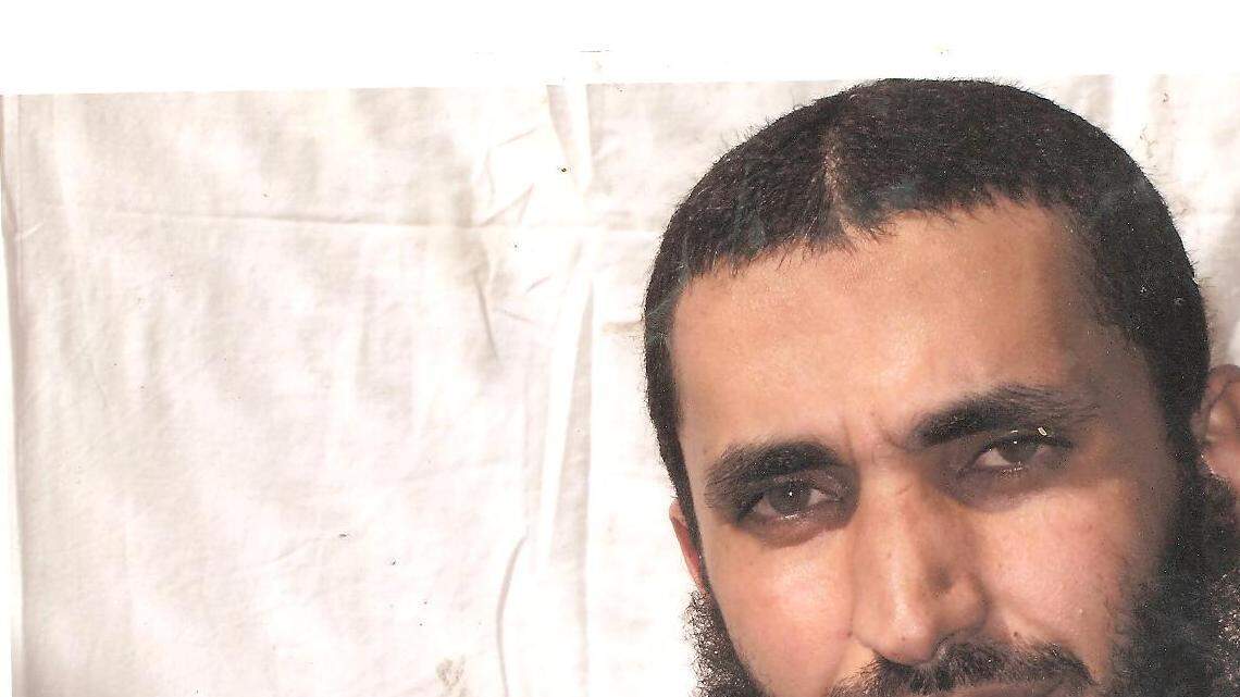 Abdel Malik Wahab al Rahabi, an indefinite detainee at Guantánamo, gets a parole board hearing on Tuesday, Jan. 28, but observers won't get to hear him speak. Rahabi is shown here posing for an International Red Cross photographer in a photo obtained from the Yemeni Human Rights group Hood.