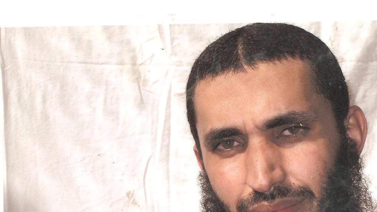 Abdel Malik Wahab al Rahabi, an indefinite detainee at Guantánamo, gets a parole board hearing on Tuesday, Jan. 28, but observers won't get to hear him speak. Rahabi is shown here posing for an International Red Cross photographer in a photo obtained from the Yemeni Human Rights group Hood.
