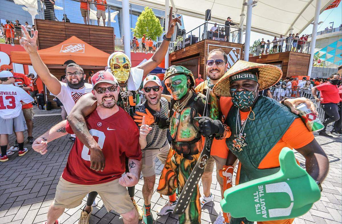 Miami Hurricanes and Alabama Crimson Tide show their support before the Chick-fil-A Kickoff Game at Mercedez-Benz Stadium in Atlanta on Saturday, September 4, 2021.