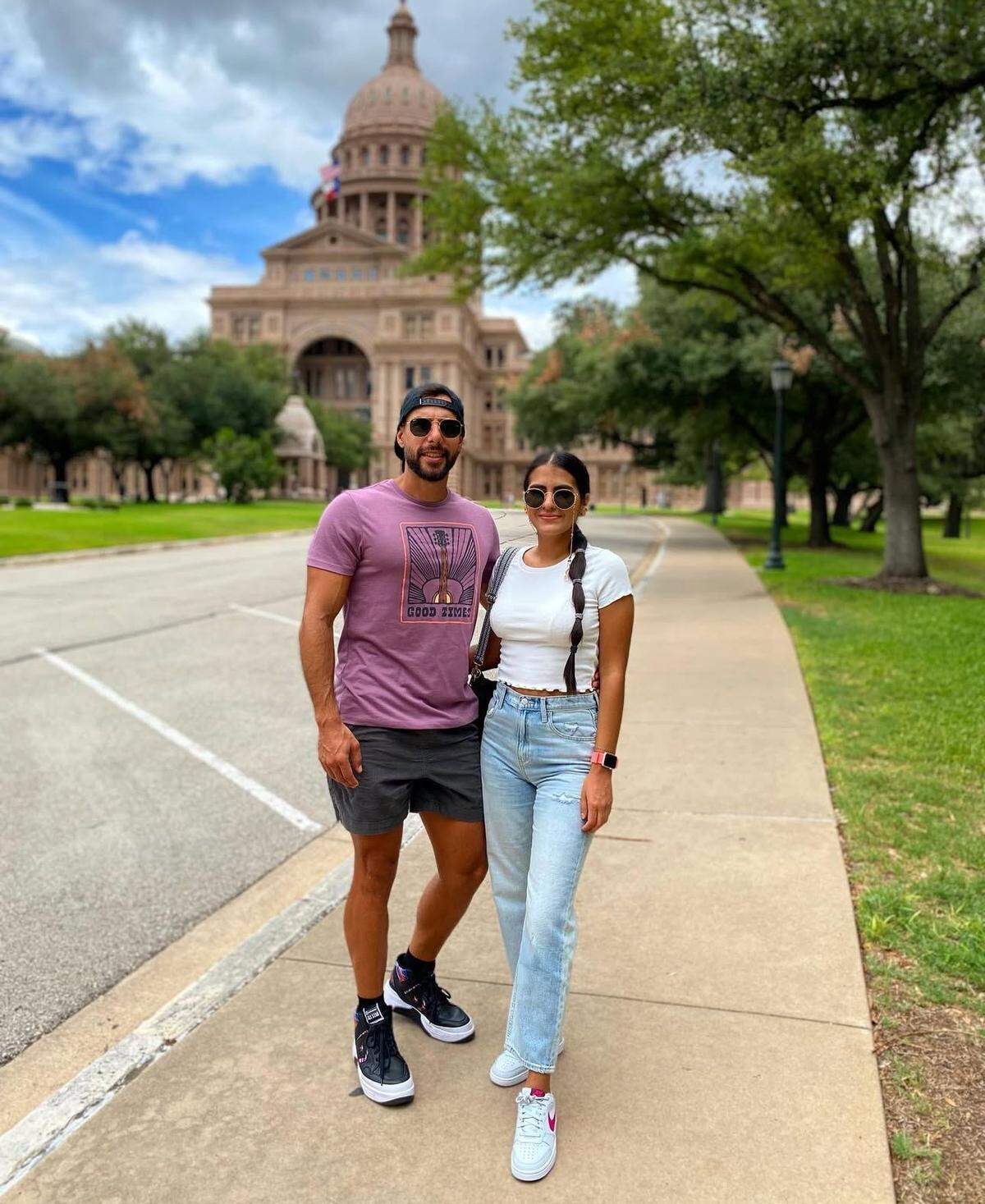 Omar Vergara Flores and his partner, Jennyfer Carrillo, near the Texas State Capitol in Austin. Vergara Flores, a Venezuelan architect, has been held in immigration detention since June despite having TPS protection.