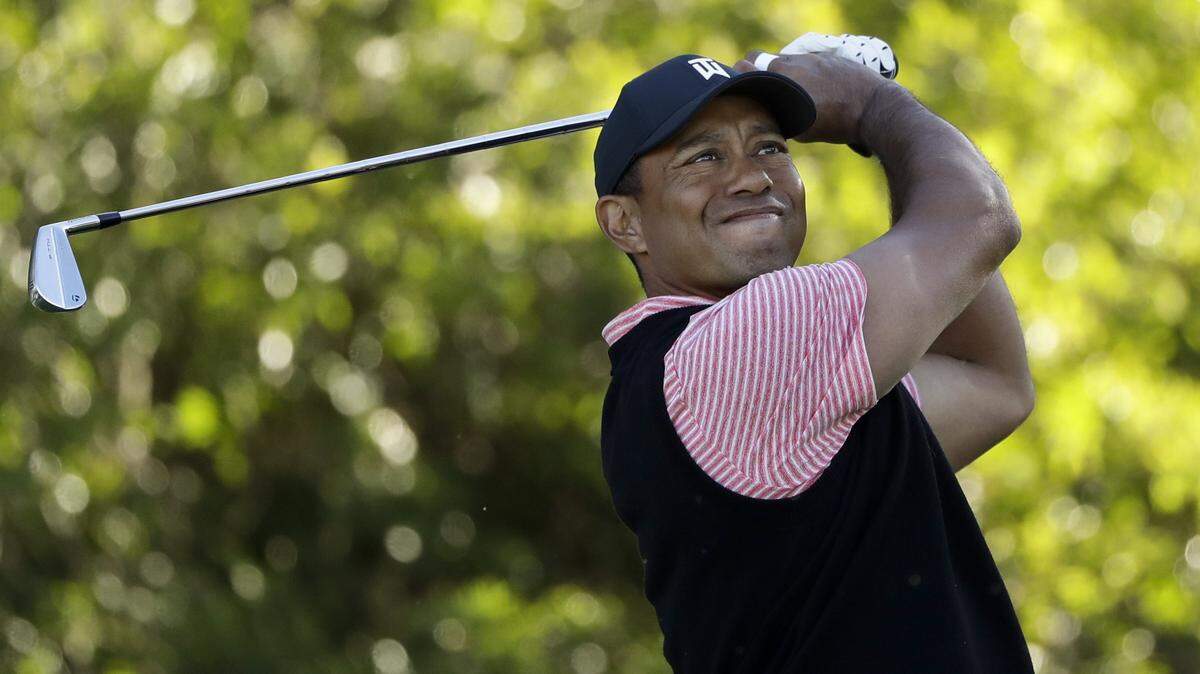 Tiger Woods hits his tee shot on the 11th hole of the South Course at Torrey Pines Golf Course during the final round of the Farmers Insurance golf tournament Sunday, Jan. 27, 2019, in San Diego. (AP Photo/Gregory Bull)