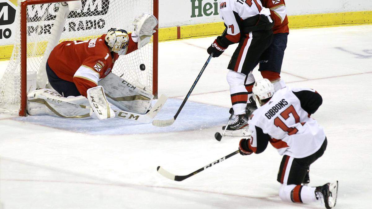 Ottawa Senators’ Brian Gibbons (17) scores a goal against Florida Panthers goalkeeper Roberto Luongo (1) during the second period of an NHL hockey game, Sunday, March 3, 2019, in Sunrise, Fla. (AP Photo/Luis M. Alvarez)