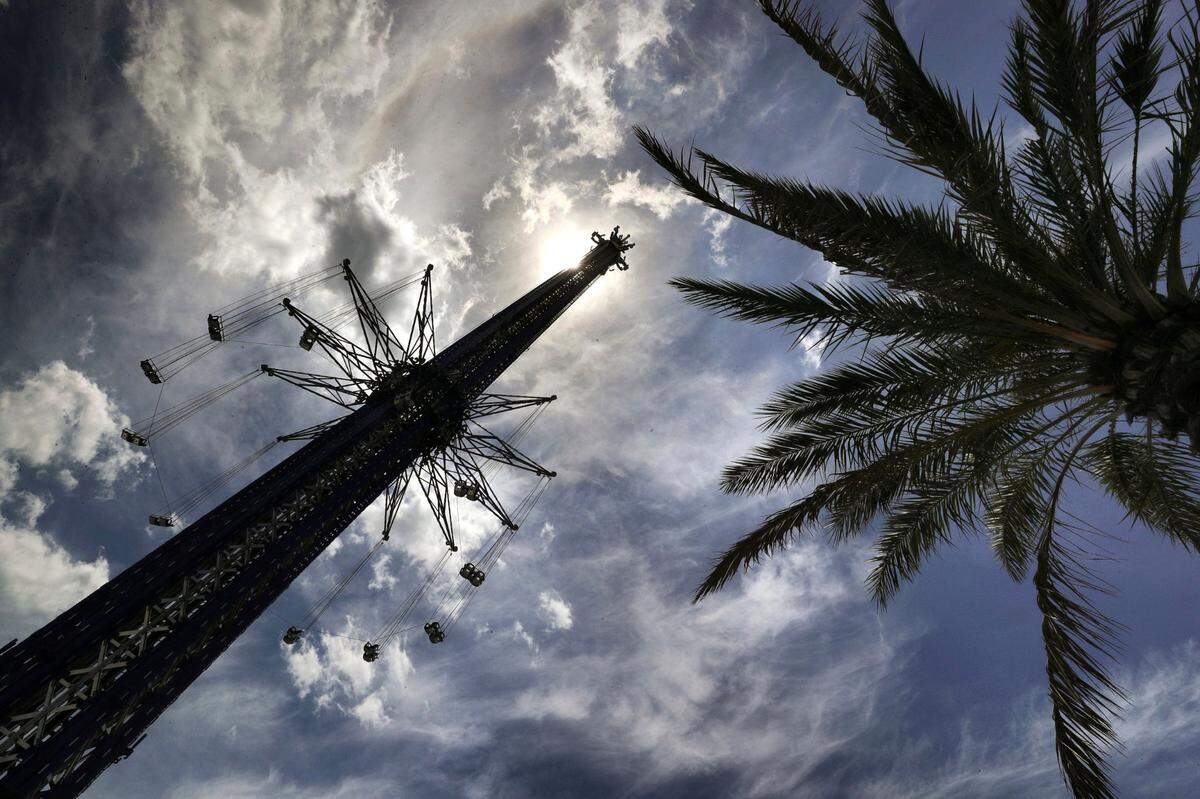 FILE - In this April 23, 2020 file photo, the Orlando Starflyer swing ride remains closed on a deserted International Drive as the response to the coronavirus pandemic takes its toll on the entertainment, shopping and dining district south of downtown Orlando, Fla. A worker doing an inspection on the popular central Florida thrill ride was killed Monday, Sept. 14 after falling more than 50 feet (15.2 meters). 