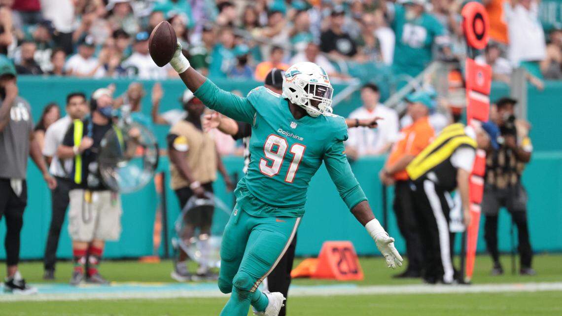 Miami Dolphins defensive end Emmanuel Ogbah (91) reacts after recovering a fumble in the first half against the New York Jets at Hard Rock Stadium in Miami Gardens on Sunday, December 19, 2021.