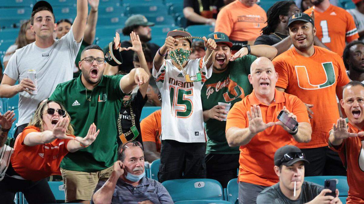 Miami Hurricanes fans show their support during game against Virginia Cavaliers at Hard Rock Stadium in Miami Gardens on Thursday, September 30, 2021.