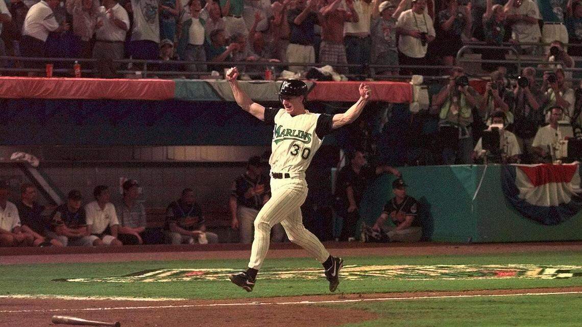 In this Oct. 26, 1997, file photo, Craig Counsell scores the winning run in the bottom of the 11th inning on a hit by Edgar Renteria in Game 7 of the 1997 World Series between the Florida Marlins and Cleveland Indians.