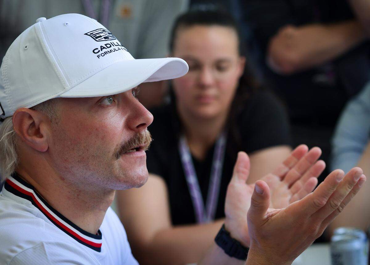 Valtteri Bottas of Finland and driver of the (77) Cadillac Formula 1 Team answers questions from members of the media in the paddock during media day for the Formula One Miami Grand Prix at the Miami International Autodrome at Hard Rock Stadium on Thursday, April 30, 2026, in Miami Gardens, Florida.
