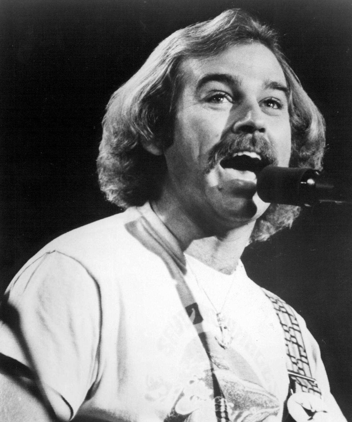 Jimmy Buffett on stage.