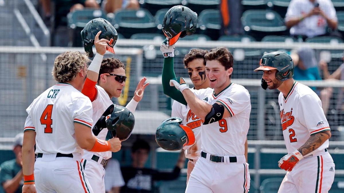 Miami Hurricanes outfielder Zach Levenson (9) hits a grand slam bringing in Edgardo Villegas (45), CJ Kayfus (2) and Blake Cyr (4) in the third inning against the Duke at Mark Light Field at Alex Rodriguez Park in Coral Gables, Florida on Saturday, May 20, 2023.