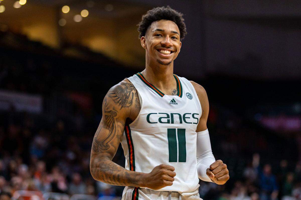 Hurricanes guard Jordan Miller (11) reacts to scoring during the second half of a men’s NCAA basketball game against Boston College at Watsco Center in Coral Gables, Florida, on Wednesday, January 11, 2023.