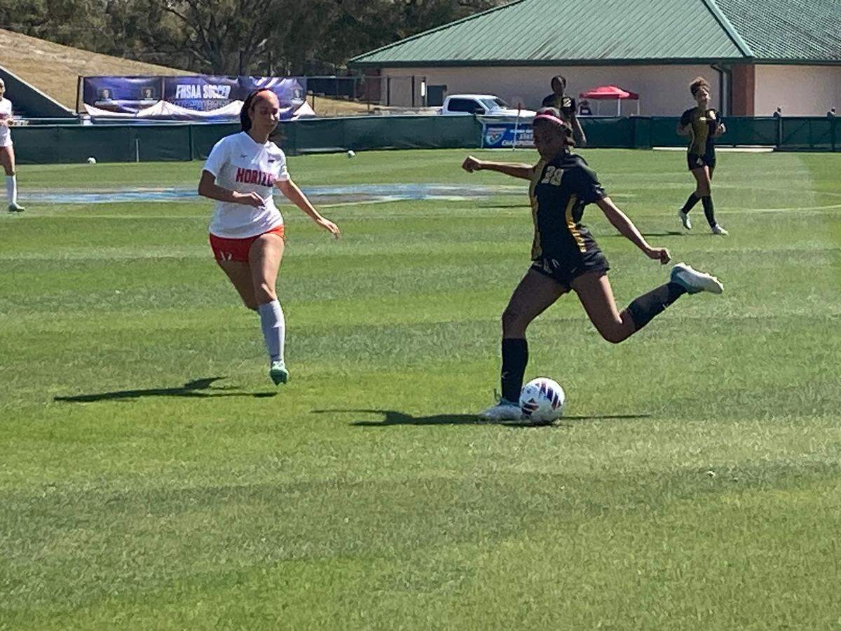 American Heritage’s Zahira Freeman winds up for a shot during the first half of Tuesday afternoon’s Class 5A state semifinal at Spec Martin Stadium in DeLand, Fla.