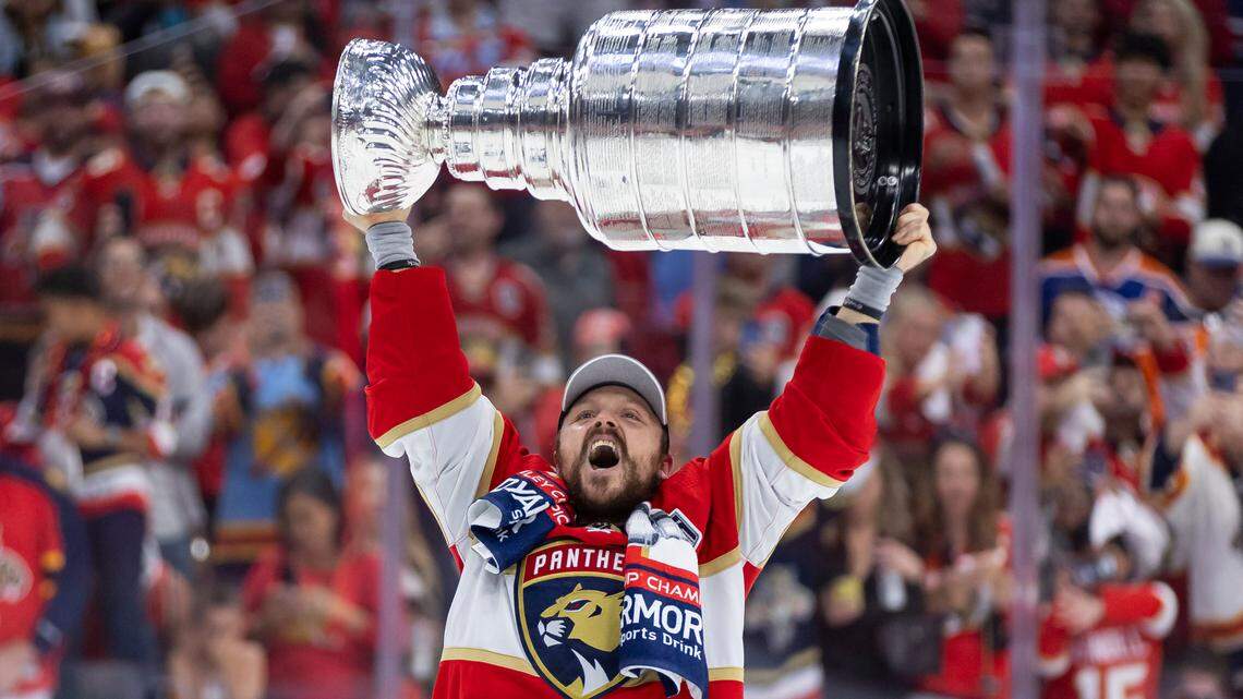 Florida Panthers center Sam Reinhart (13) reacts while lifting the Stanley Cup after defeating the Edmonton Oilers in Game 7 of the Stanley Cup Final at Amerant Bank Arena on Monday, June 24, 2024, in Sunrise, Fla.