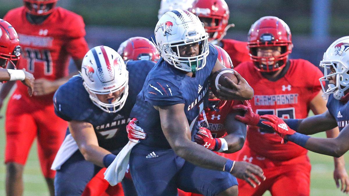 Chaminade-Madonna running back Thaddius Franklin (1) helps set up a first quarter touchdown as they play Champagnat Catholic at Chaminade-Madonna College Preparatory School, Hollywood, Florida, Friday, September 11, 2020.