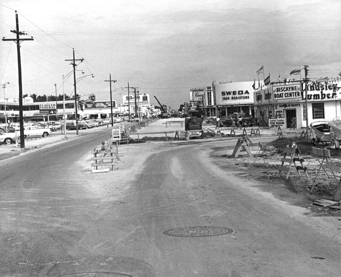 The road along Northeast 79th Street east of the railroad tracks and looking toward Biscayne Boulevard.