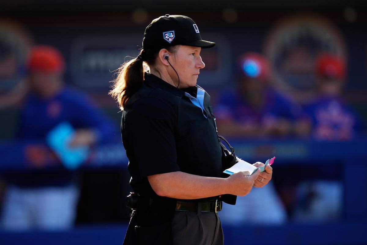 Mar 19, 2024; Port St. Lucie, Florida, USA; Umpire Jen Pawol looks on during a game between the New York Mets and the St. Louis Cardinals at Clover Park. Mandatory Credit: Rich Storry-USA TODAY Sports