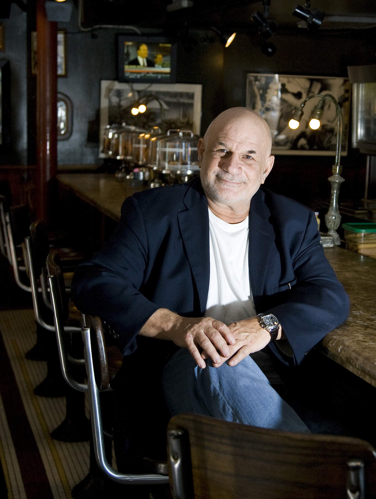 In this file photo from Dec. 10, 2008, Mark Soyka poses for a portrait inside of his landmark News Cafe at 800 Ocean Dr. in Miami Beach. The News Cafe celebrated 20 years at the time.