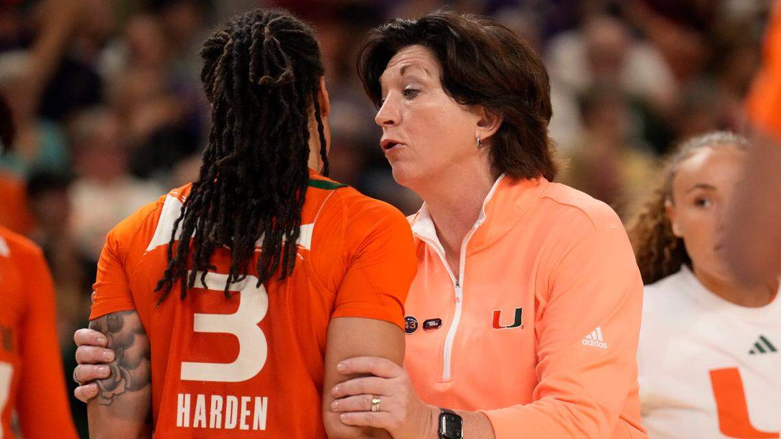 Mar 26, 2023; Greenville, SC, USA; Miami Hurricanes head coach Katie Meier talks with Miami Hurricanes forward Destiny Harden (3) during a time out against the LSU Lady Tigers during the NCAA WomenÕs Tournament at Bon Secours Wellness Arena. Mandatory Credit: Jim Dedmon-USA TODAY Sports
