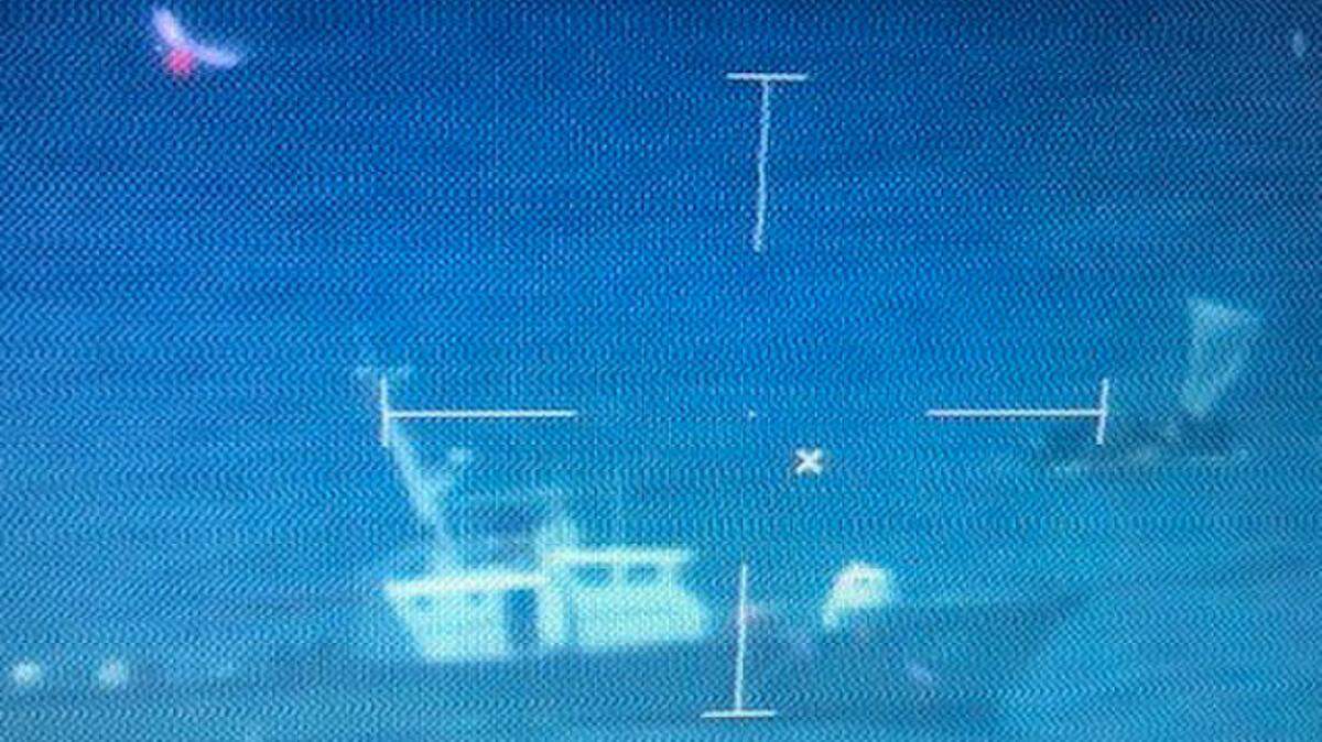 The U.S. Coast Guard tracks a boat with Cuban migrants on board about 82 miles southwest of Key West Monday, May 10, 2021.