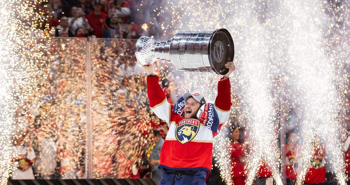 Florida Panthers center Aleksander Barkov (16) lifts the Stanley Cup after defeating the Edmonton Oilers in Game 7 of the Stanley Cup Final at Amerant Bank Arena on Monday, June 24, 2024, in Sunrise, Fla.