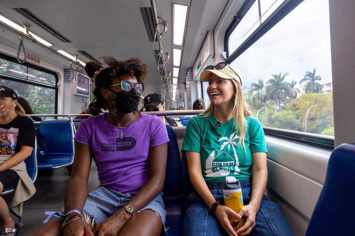 Z Spicer and Maria Claudia Schubert, climate justice organizers at Catalyst, take the bus home together from work.