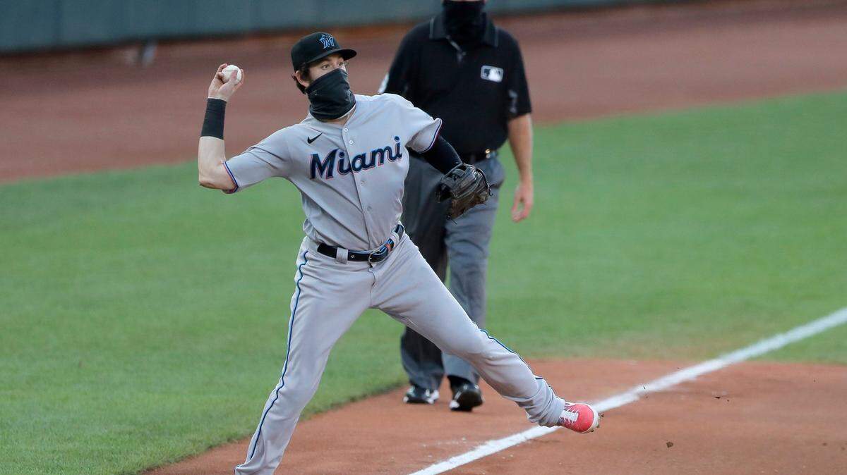 Miami Marlins third baseman Brian Anderson throws out Baltimore Orioles’ Chris Davis at first base on a groundout during the seventh inning in game one of a baseball double-header, Wednesday, Aug. 5, 2020, in Baltimore. The Marlins won 1-0.