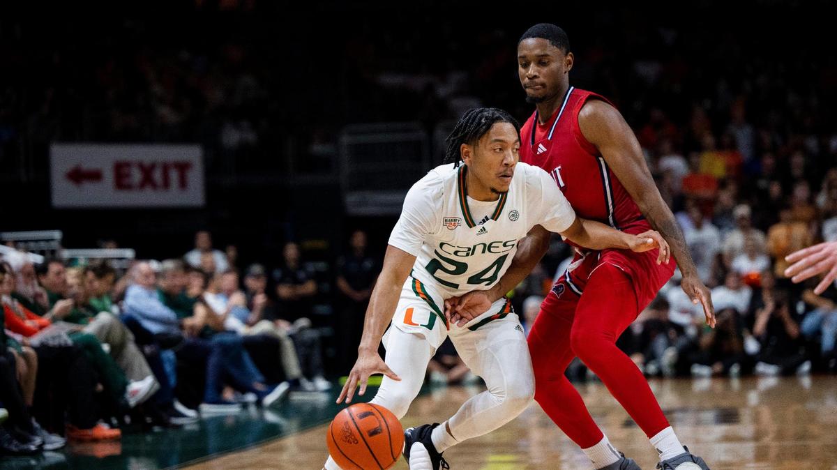 Miami Hurricanes guard Nijel Pack (24) dribbles around N.J.I.T Highlanders guard Sebastian Robinson (0) during the first half of the Miami Hurricanes home opener against NJIT on Monday. He will have to take care of the ball against UCF, which had 16 steals against FIU in its last game.