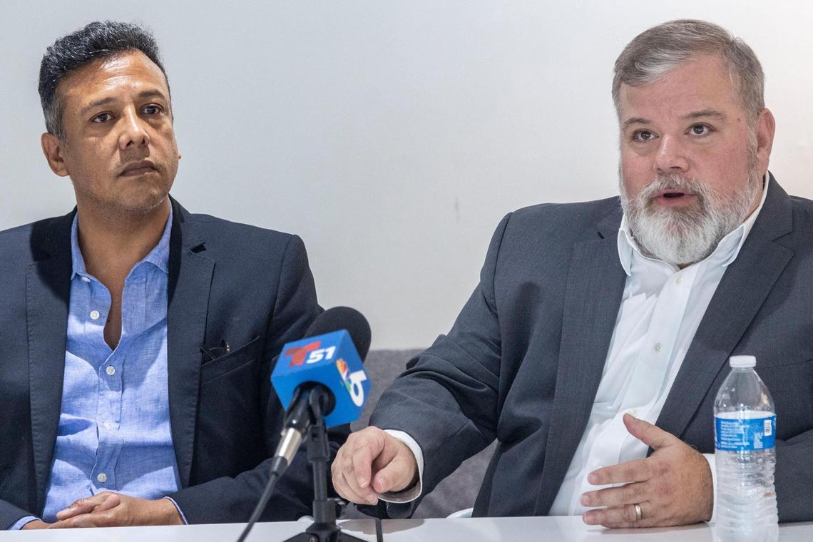 Jose Canto, left, former finance director of the Bayfront Park Management Trust, and Jose Suarez, right, former executive director of the Trust, speak during a press conference at AXS Law in Miami on Wednesday, Jan. 22, 2025. Suarez previously worked as Carollo’s chief of staff. Canto and Suarez filed a lawsuit in federal court Tuesday night accusing Carollo of retaliation and using the city agency for personal gain.