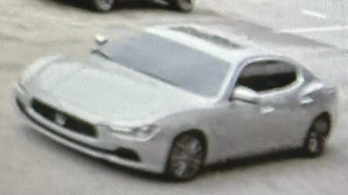 An escaped suspect slipped away from police at Jackson Memorial Hospital, fleeing in a silver Maserati. Police are searching for him.