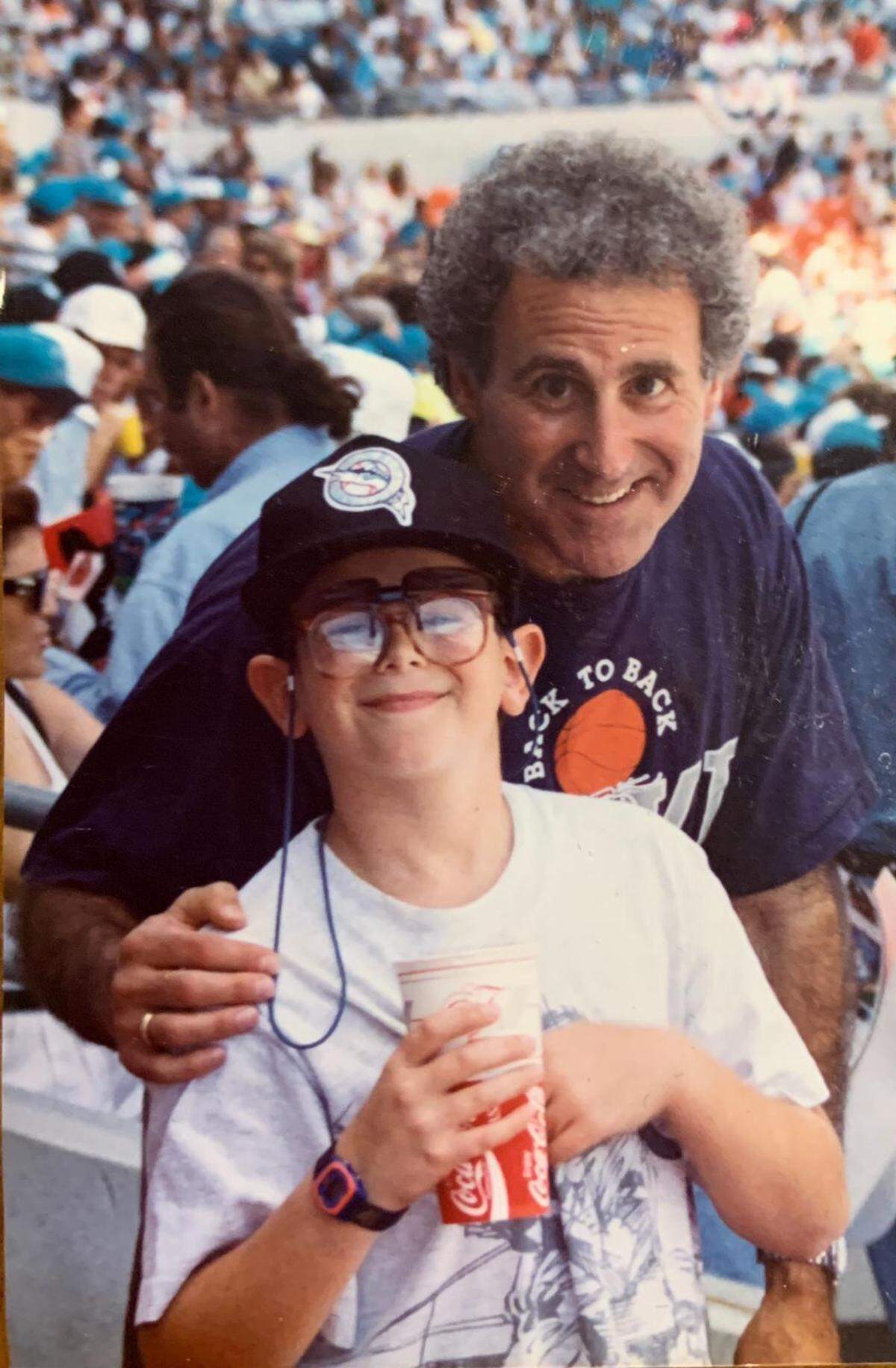Leonard Kalman, right, attending a baseball game with his son, Noah Kalman.