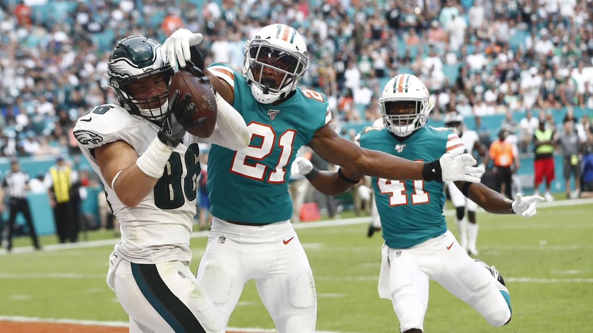 Philadelphia Eagles tight end Zach Ertz can’t hold onto a would-be touchdown pass Sunday because of an excellent play by Dolphins safety Eric R