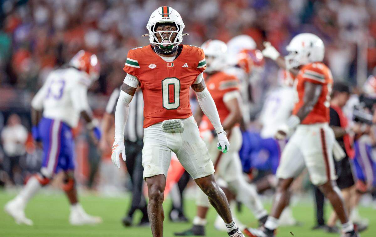 Miami Hurricanes defensive back Keionte Scott (0) attempts to motivate the crowd to make noise during their NCAA football game against the Florida Gators at Hard Rock Stadium in Miami Gardens, Florida, on Saturday, September 20, 2025.
