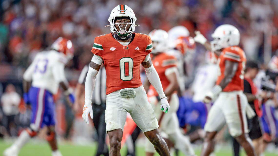 Miami Hurricanes defensive back Keionte Scott (0) attempts to motivate the crowd to make noise during their NCAA football game against the Florida Gators at Hard Rock Stadium in Miami Gardens, Florida, on Saturday, September 20, 2025.