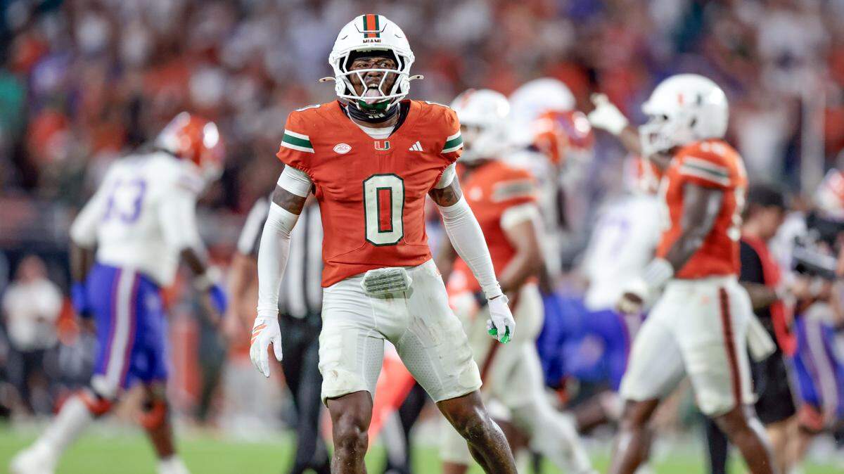 Miami Hurricanes defensive back Keionte Scott (0) attempts to motivate the crowd to make noise during their NCAA football game against the Florida Gators at Hard Rock Stadium in Miami Gardens, Florida, on Saturday, September 20, 2025.