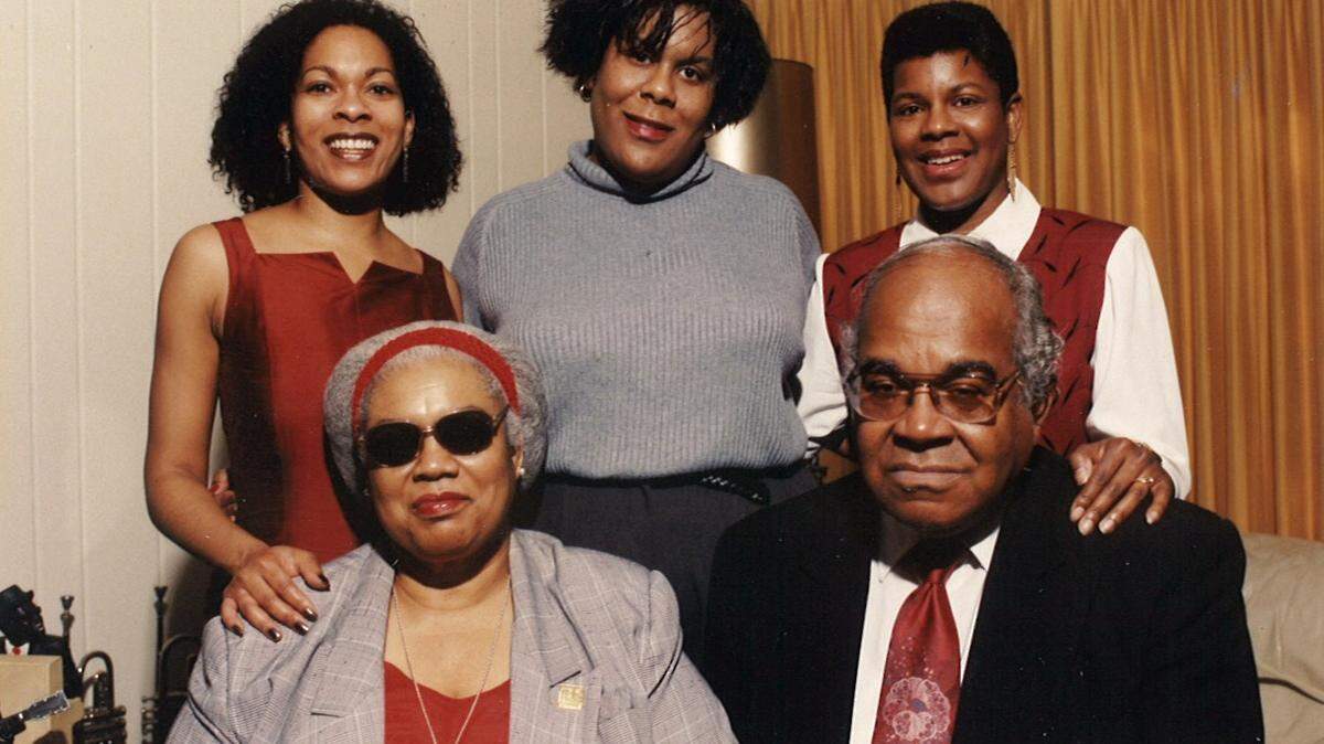 Back row, from left: Johnita Due, Lydia Due Greisz and Tananarive Due celebrate with their parents, Patricia Stephens Due and John D. Due Jr., on Jan. 1, 2000.