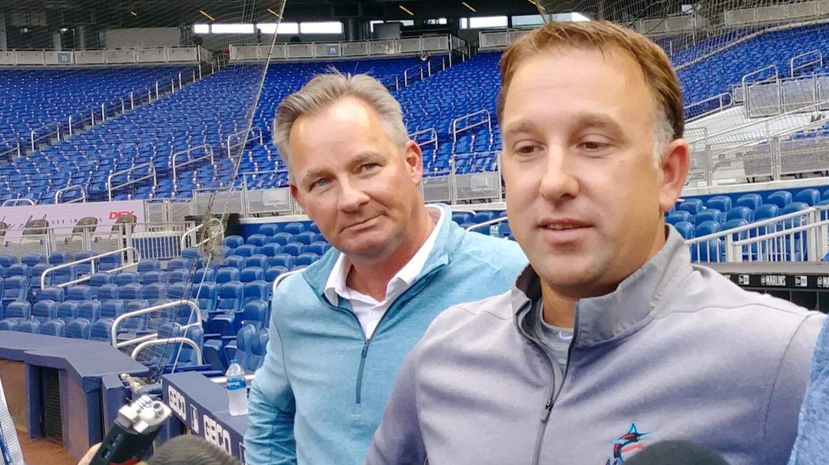 Seen in this May 29, 2019, file photo, Miami Marlins director of amateur scouting DJ Svihlik (right) talks about the Miami Marlins draft preparation.