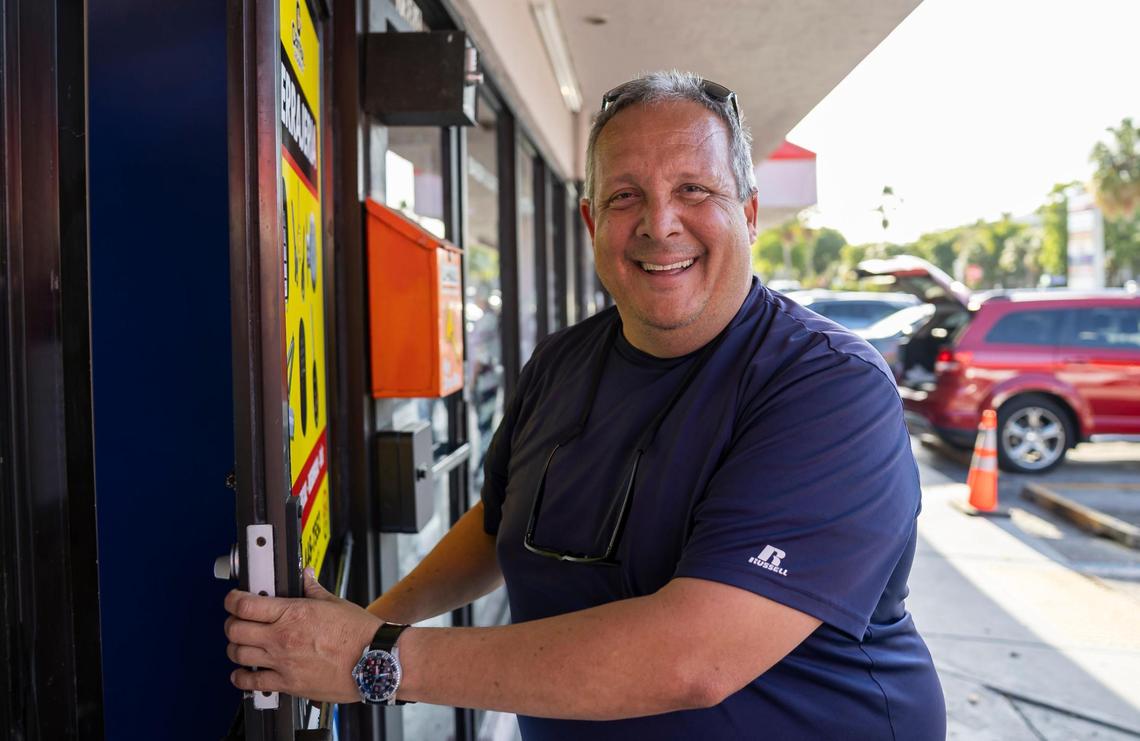 Javier Portillo, 52, who was born in Venezuela, leaves an electronics shop after talking about some of his political views on Friday, April 11, 2025, in Doral, Fla.