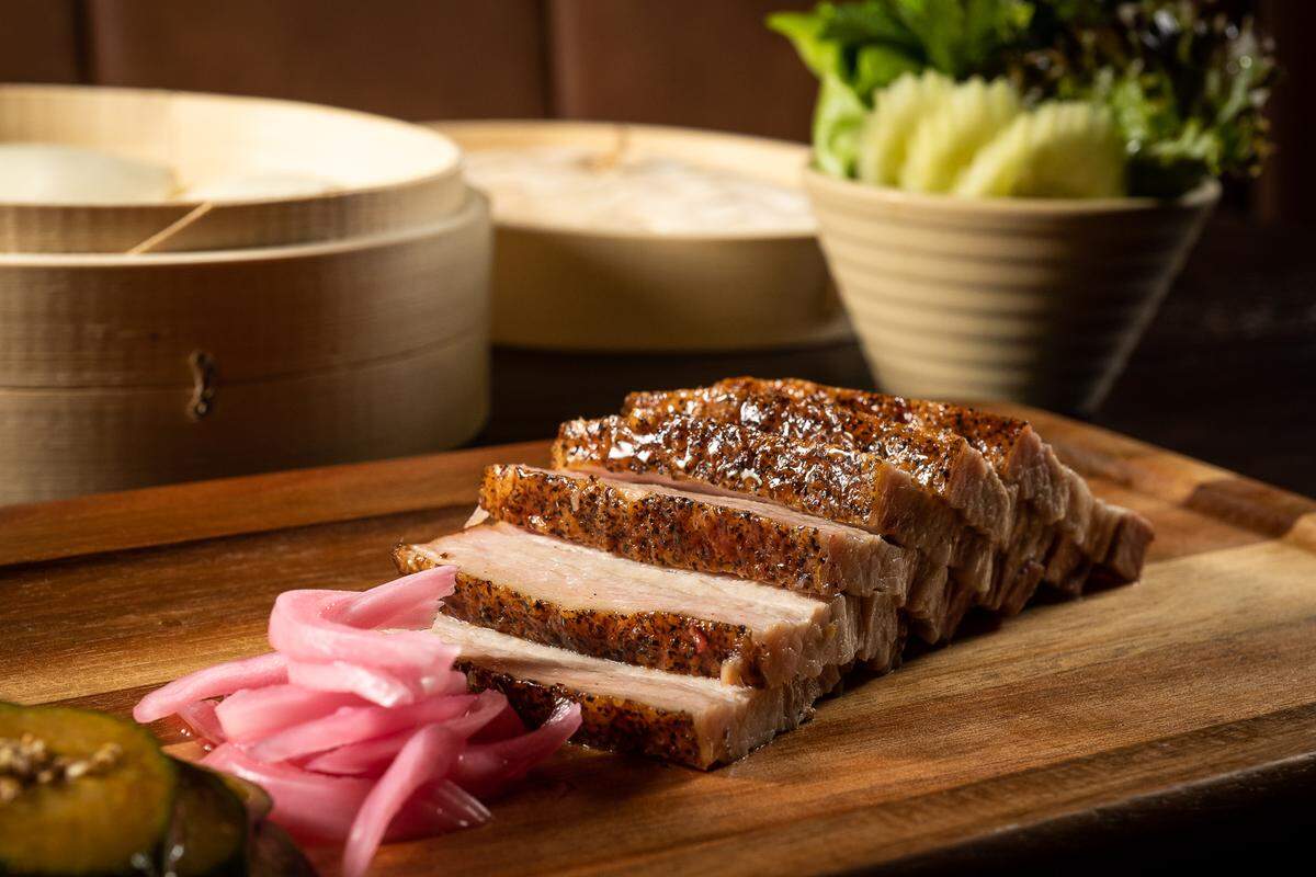 Beer-brined pork belly at Est. 33 Thai Craft Brewery and Kitchen. If that’s not a good use of beer, we don’t know what is.