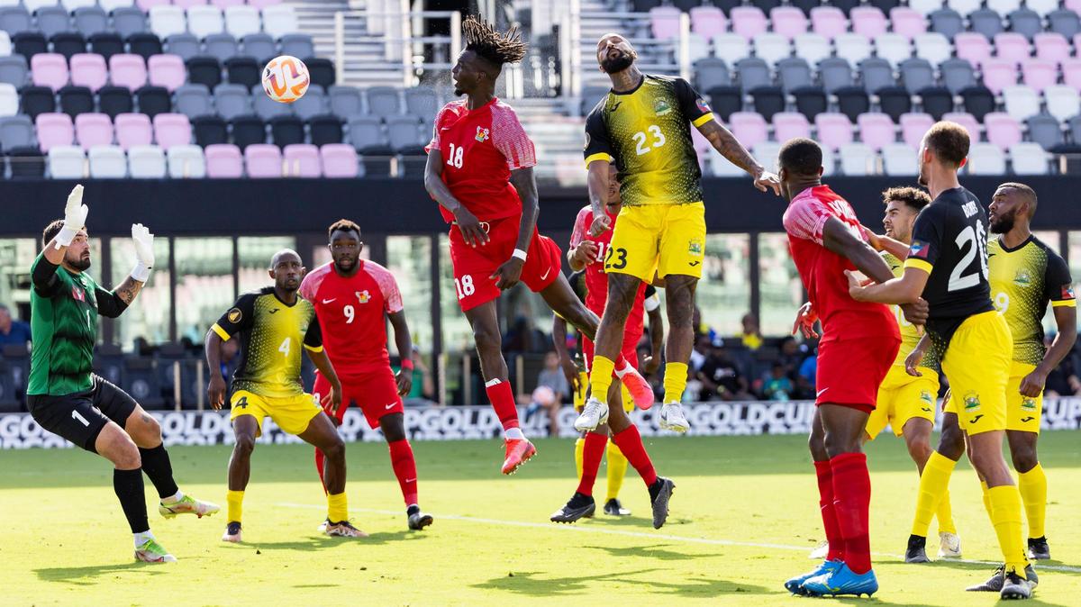 Guadeloupe defender Steve Loic Solvet (18) scores a header against Antigua and Barbuda goalkeeper Nicholas Townsend (1) in the first half of their CONCACAF Gold Cup 2023 preliminary match at DRV PNK Stadium on Friday, June 16, 2023, in Fort Lauderdale, Fla.