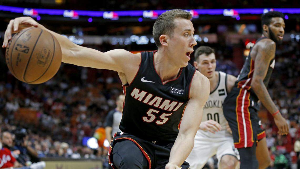 Miami Heat forward Duncan Robinson (55) controls the ball from going out of bounds in the fourth quarter as the Miami Heat host the Brooklyn Nets at the AmericanAirlines Arena on Saturday, March 2, 2019.