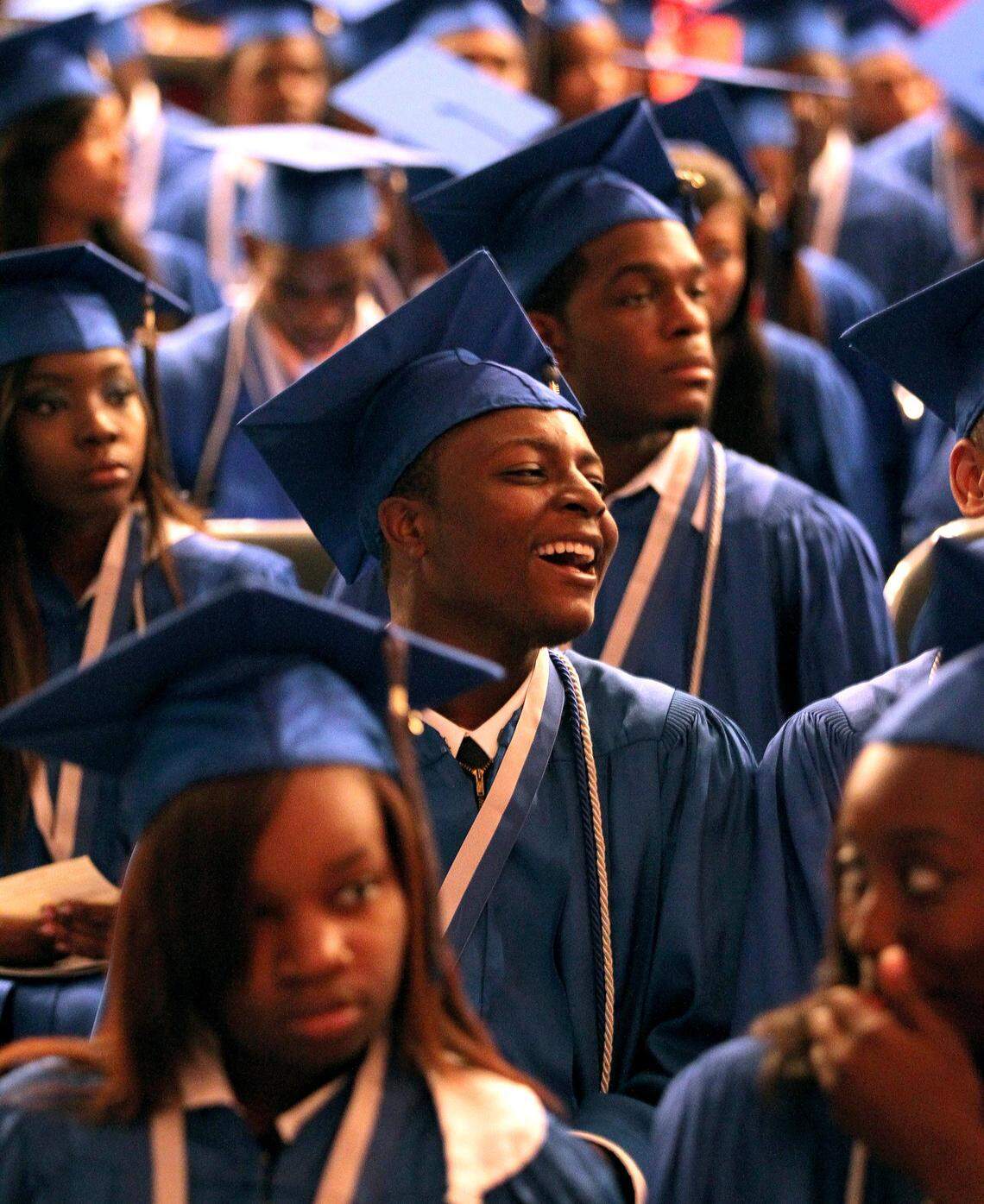 Dillard HS student Kenzon Fredinand, listens to speakers at her graduation ceremony at War Memorial Auditorium in Fort Lauderdale, June 4, 2013.