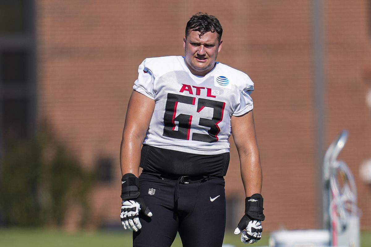Jul 26, 2023; Flowery Branch, GA, USA; Atlanta Falcons guard Chris Lindstrom (63) on the field during the first day of training camp at IBM Performance Field. Mandatory Credit: Dale Zanine-USA TODAY Sports