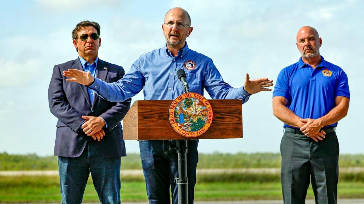 Florida Division of Emergency Management Director Kevin Guthrie speaks to reporters during a press conference on the airplane runway of Alligator Alcatraz in Ochopee , Florida on Friday, July 25, 2025.