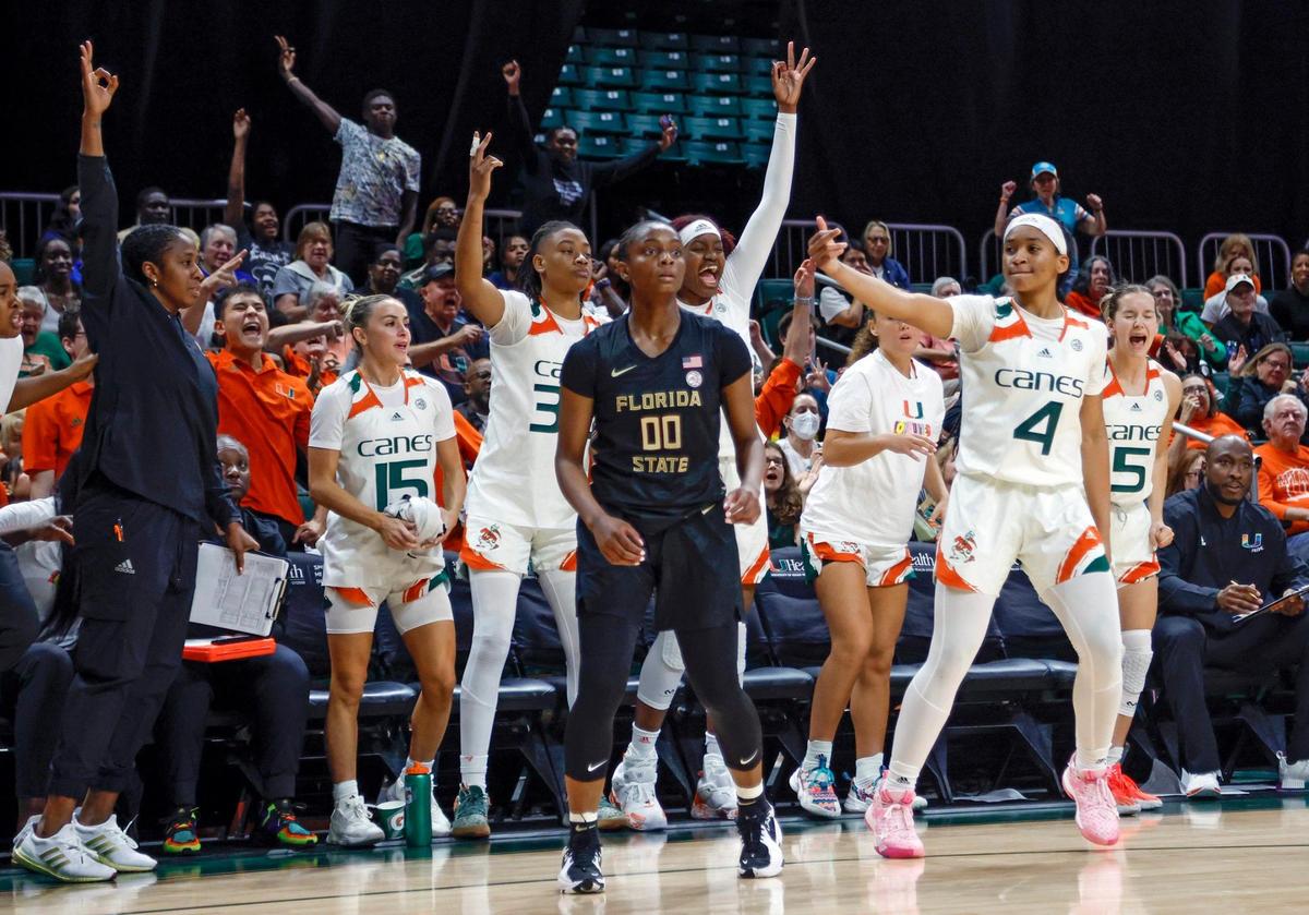 Miami Hurricanes guard Jasmyne Roberts (4) reacts after sinking a three-pointer in the second half against Florida State Seminoles at the Watsco Center in Coral Gables, Fl. on Thursday, February 9, 2023.