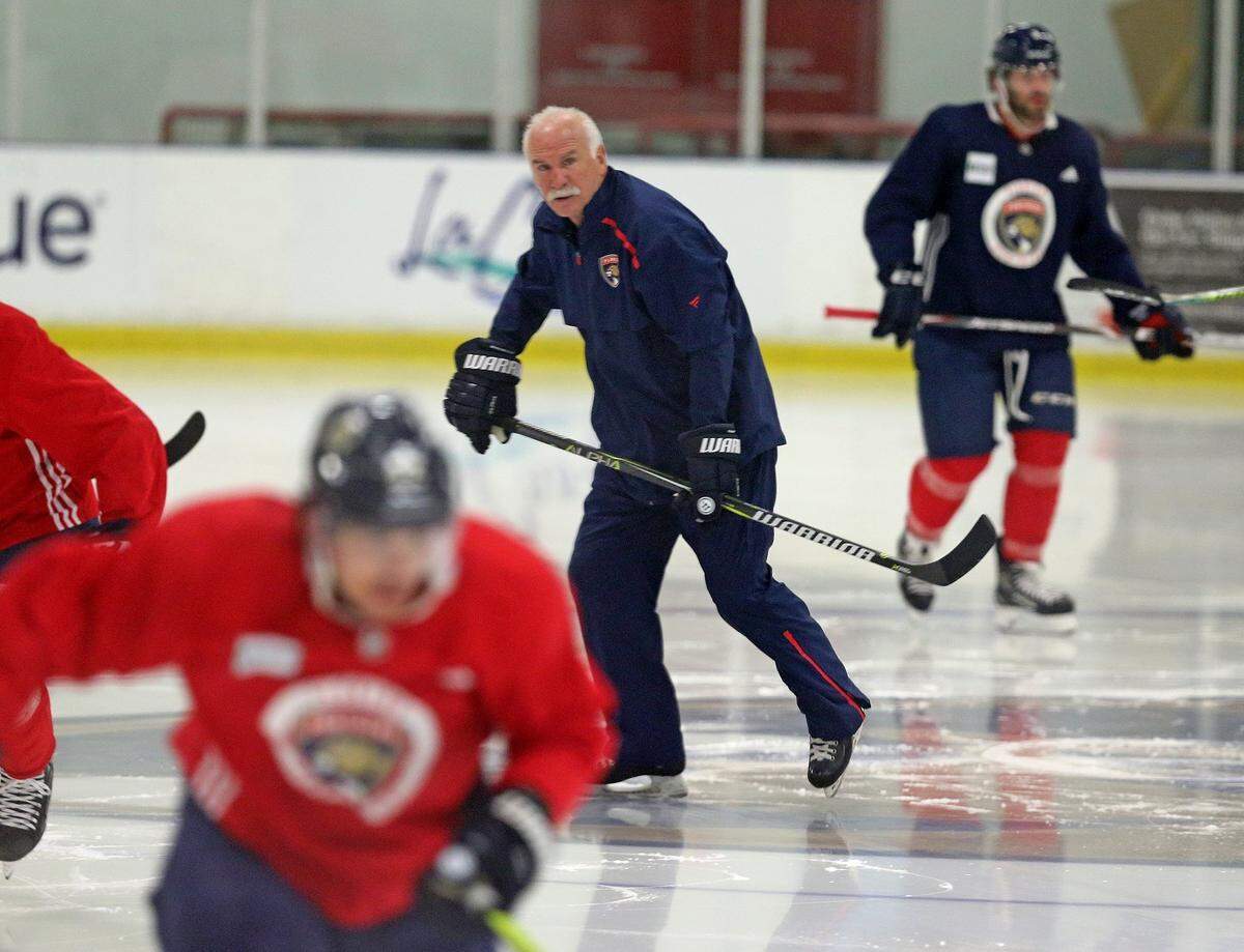 Florida Panthers coach Joel Quenneville on the ice as they train at their practice facility in Coral Springs, Florida, July 15, 2020.